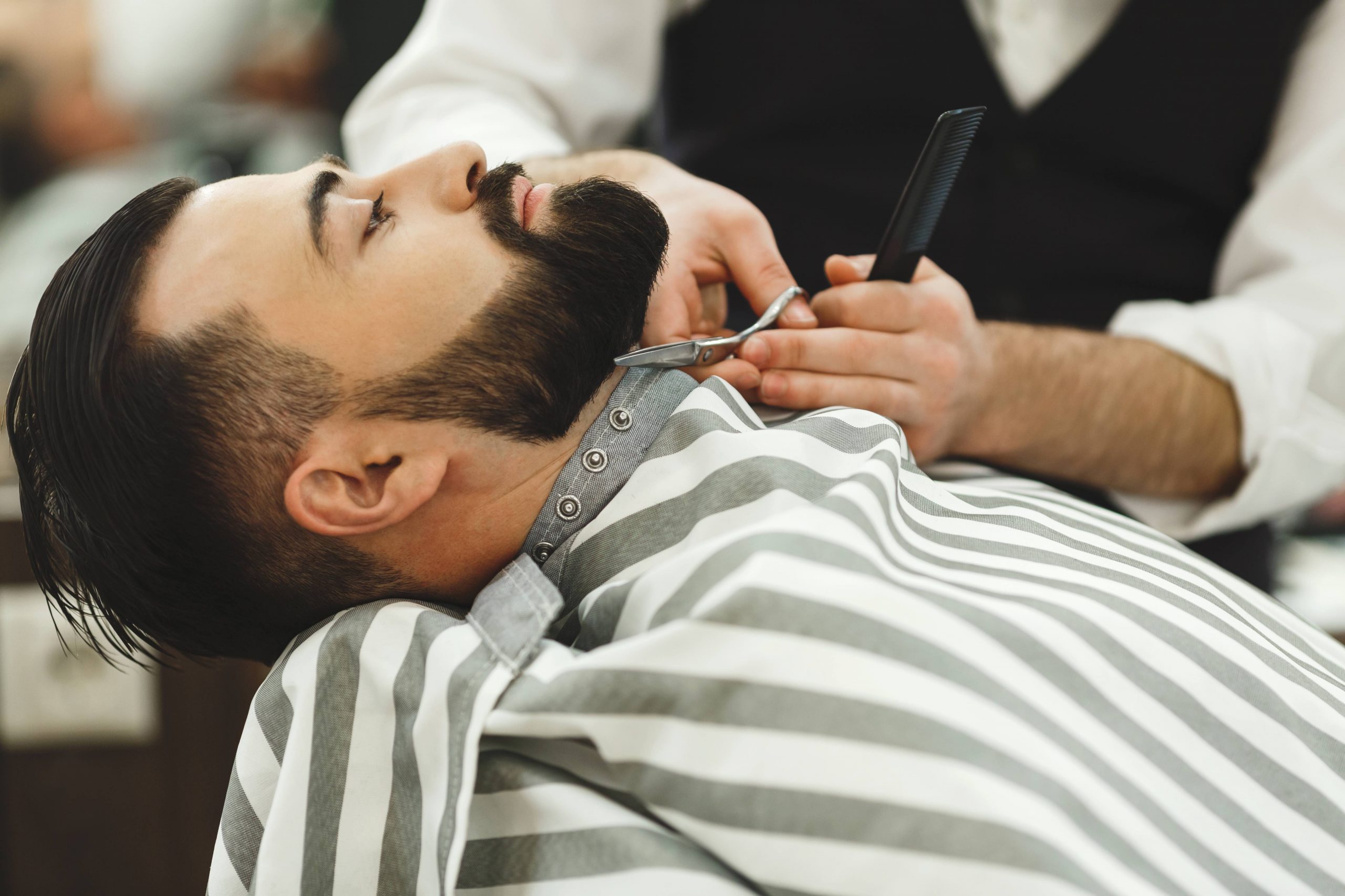 Man Getting Beard Trimmed