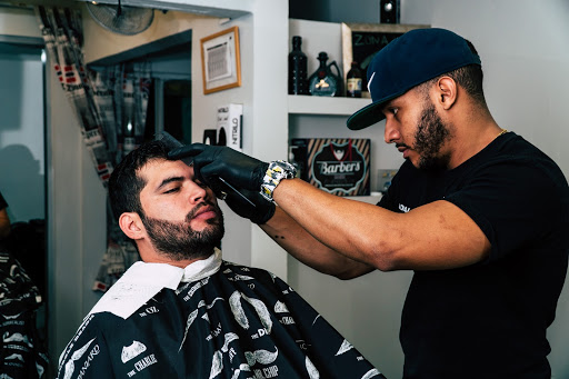 barber cutting client's hair