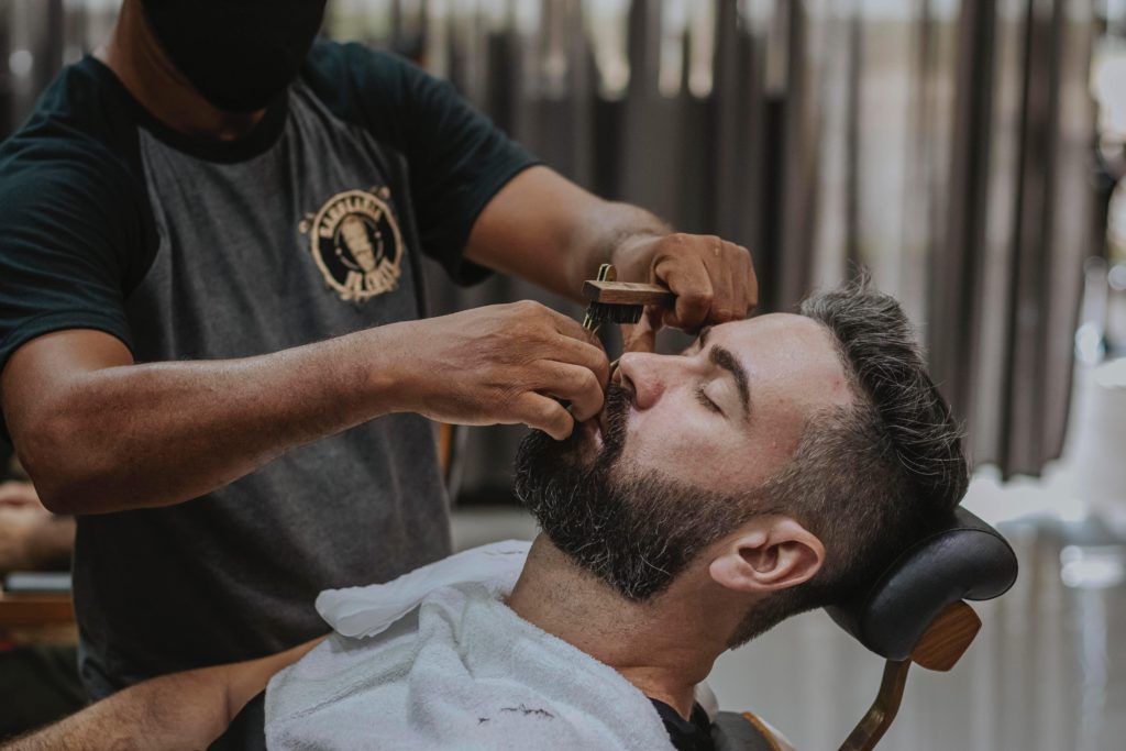 Barber performing a shave service
